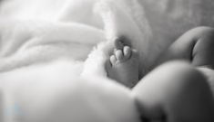 baby toes and white blanket